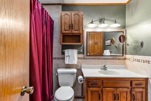 480 Suzanne Ave, Shoreview, MN 55126 - bathroom with tile walls, toilet, vanity, and curtained shower