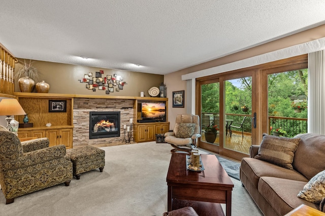 480 Suzanne Ave, Shoreview, MN 55126 - carpeted living area with a textured ceiling and a stone fireplace