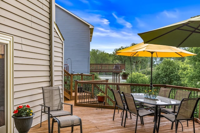 480 Suzanne Ave, Shoreview, MN 55126 - wooden deck with outdoor dining area