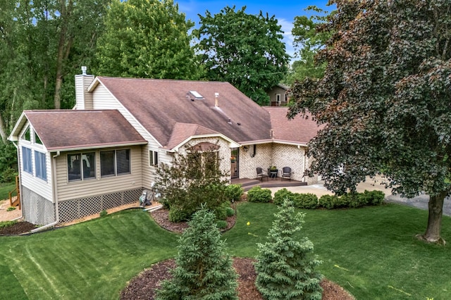 480 Suzanne Ave, Shoreview, MN 55126 - rear view of property with a patio area, a lawn, a chimney, and roof with shingles