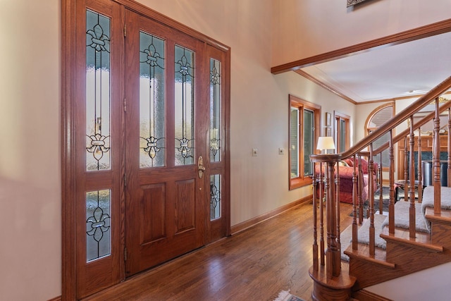 1438 Kings Wood Rd, Eagan, MN 55122 - entrance foyer with stairway, crown molding, baseboards, and wood finished floors