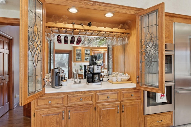 1438 Kings Wood Rd, Eagan, MN 55122 - bar area with stainless steel appliances, dark wood-style flooring, a sink, and recessed lighting
