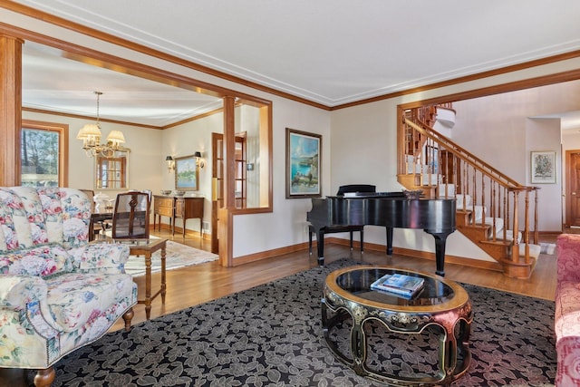1438 Kings Wood Rd, Eagan, MN 55122 - living room with wood finished floors, crown molding, stairway, baseboards, and a chandelier