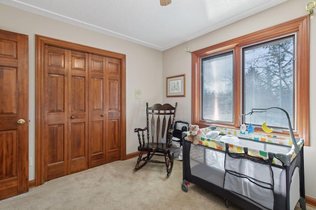 1438 Kings Wood Rd, Eagan, MN 55122 - living area featuring light carpet and baseboards