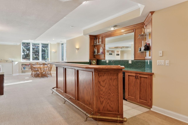 1438 Kings Wood Rd, Eagan, MN 55122 - community bar area with backsplash, crown molding, baseboards, and light tile patterned flooring