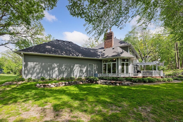 1438 Kings Wood Rd, Eagan, MN 55122 - rear view of house featuring a pergola, a deck, a yard, and a chimney