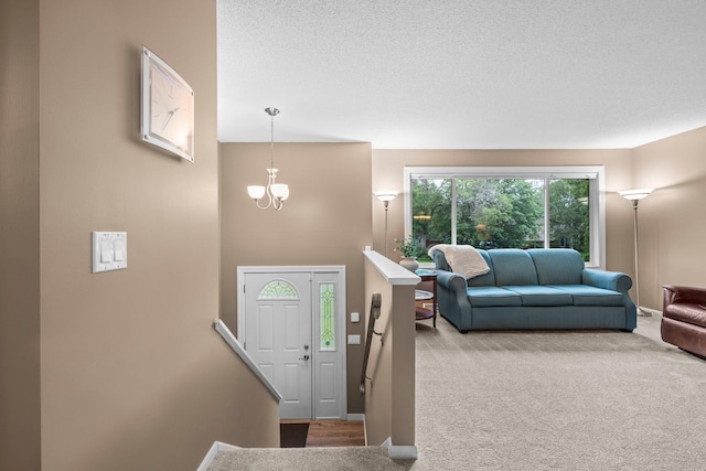 824 96th Ln NE, Blaine, MN 55434 - carpeted entrance foyer featuring a chandelier and a textured ceiling