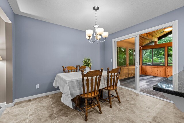 824 96th Ln NE, Blaine, MN 55434 - dining space with a chandelier and light tile patterned floors
