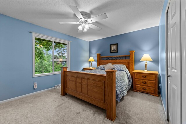 824 96th Ln NE, Blaine, MN 55434 - carpeted bedroom featuring baseboards and ceiling fan