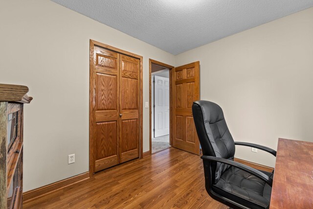 824 96th Ln NE, Blaine, MN 55434 - office space with wood finished floors and a textured ceiling
