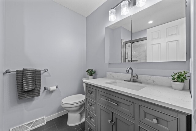 824 96th Ln NE, Blaine, MN 55434 - bathroom featuring vanity, a shower with door, and tile patterned floors