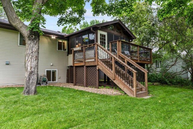824 96th Ln NE, Blaine, MN 55434 - rear view of house with stairway, a sunroom, a deck, and a yard