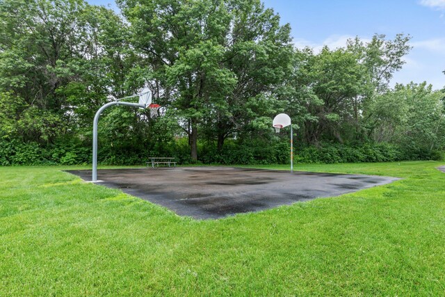 824 96th Ln NE, Blaine, MN 55434 - view of basketball court with community basketball court and a yard