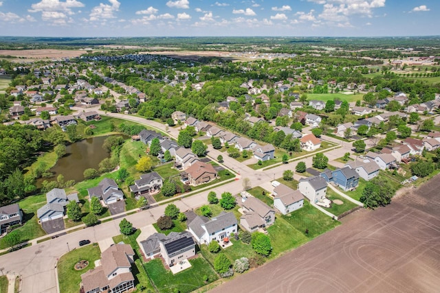 1005 Hope Ave, Jordan, MN 55352 - aerial view of property and surrounding area featuring a large body of water and nearby suburban area