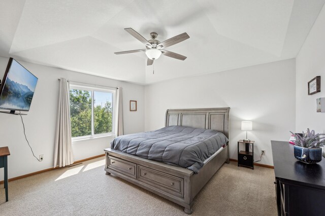 1005 Hope Ave, Jordan, MN 55352 - bedroom featuring light colored carpet, vaulted ceiling, baseboards, and ceiling fan