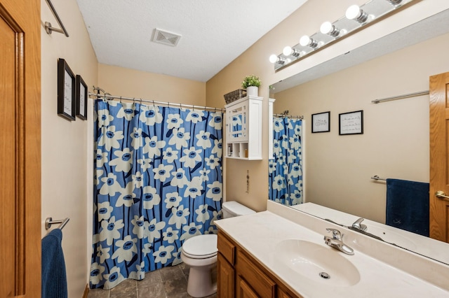 1005 Hope Ave, Jordan, MN 55352 - bathroom featuring toilet, vanity, and curtained shower