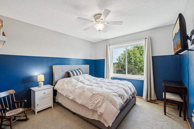 1005 Hope Ave, Jordan, MN 55352 - bedroom with light colored carpet, ceiling fan, and baseboards