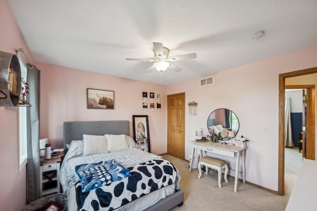 1005 Hope Ave, Jordan, MN 55352 - bedroom with light colored carpet and ceiling fan