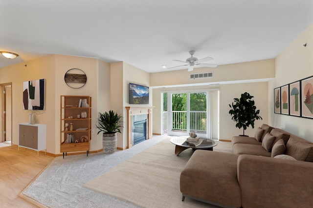 601 Levander Way Unit 208, South Saint Paul, MN 55075 - living area with ceiling fan, baseboards, and a fireplace