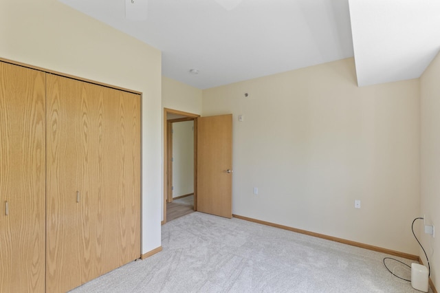 601 Levander Way Unit 208, South Saint Paul, MN 55075 - unfurnished bedroom with carpet, a closet, and baseboards