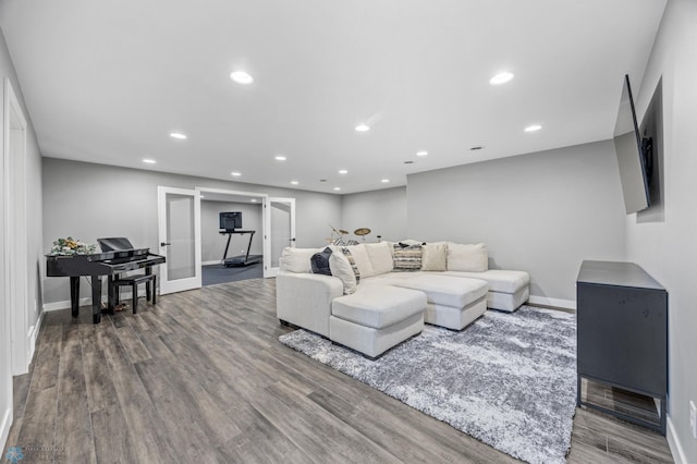 1991 69th Ave S, Fargo, ND 58104 - living area with wood finished floors, baseboards, and recessed lighting