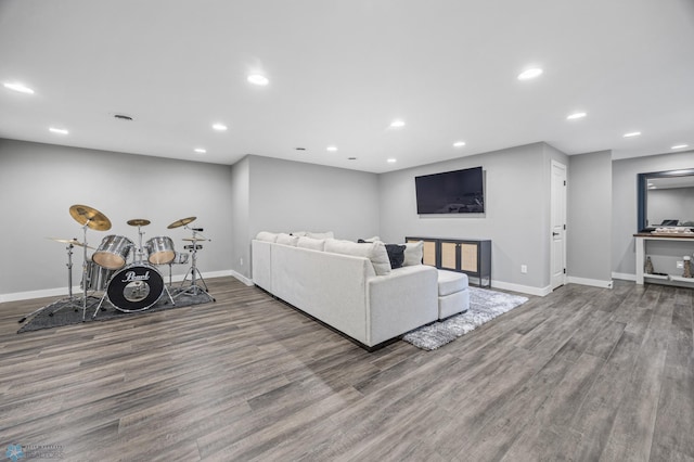 1991 69th Ave S, Fargo, ND 58104 - living room featuring baseboards, wood finished floors, and recessed lighting