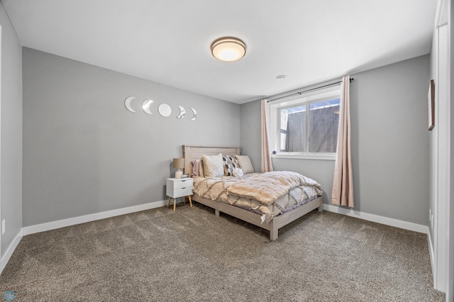 1991 69th Ave S, Fargo, ND 58104 - carpeted bedroom featuring baseboards