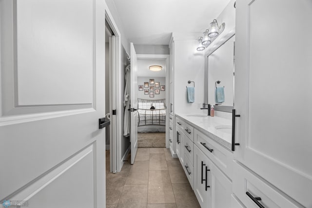 1991 69th Ave S, Fargo, ND 58104 - ensuite bathroom with double vanity and tile patterned flooring