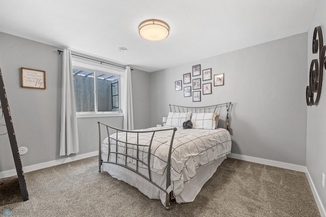 1991 69th Ave S, Fargo, ND 58104 - carpeted bedroom featuring baseboards