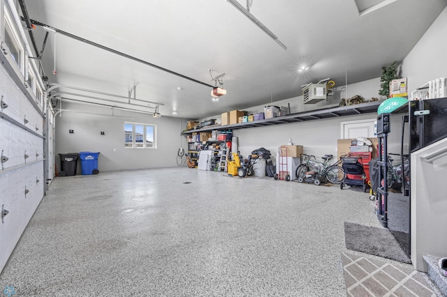 1991 69th Ave S, Fargo, ND 58104 - garage featuring a garage door opener