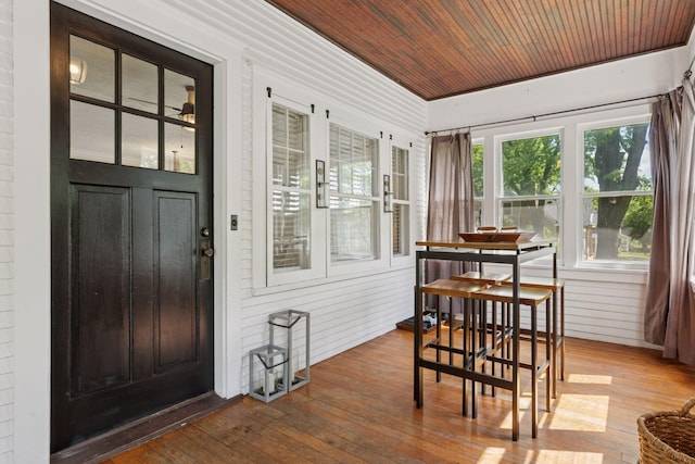 3313 Yosemite Ave S, Saint Louis Park, MN 55416 - dining space with wood ceiling, hardwood / wood-style flooring, and wooden walls