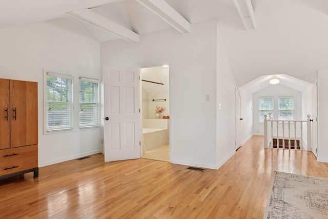 3313 Yosemite Ave S, Saint Louis Park, MN 55416 - unfurnished bedroom with light wood finished floors, baseboards, and ensuite bath