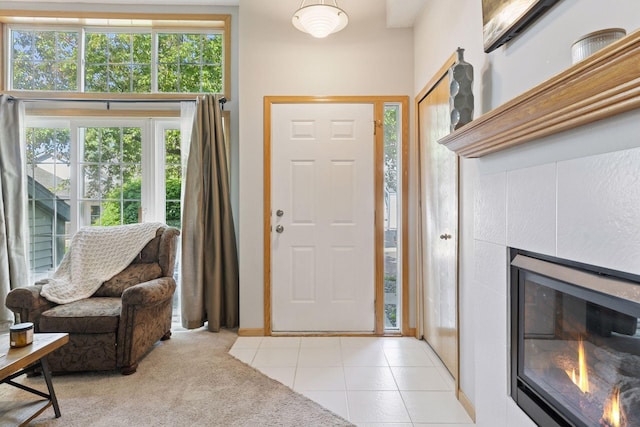 12977 Echo Ln, Apple Valley, MN 55124 - entryway with a tile fireplace and light tile patterned flooring