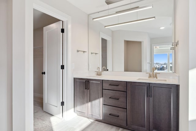 17970 103rd Ave N, Maple Grove, MN 55311 - full bath with double vanity and a walk in closet