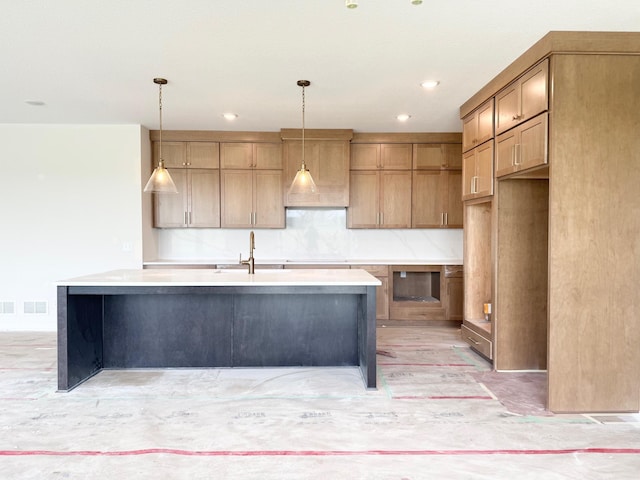 17970 103rd Ave N, Maple Grove, MN 55311 - kitchen with an island with sink, light countertops, pendant lighting, and recessed lighting
