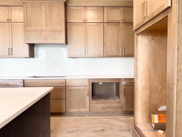 17970 103rd Ave N, Maple Grove, MN 55311 - kitchen featuring cooktop, light countertops, and light wood-style floors