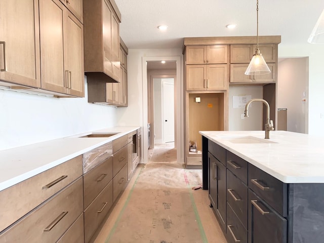 17970 103rd Ave N, Maple Grove, MN 55311 - kitchen with black electric cooktop, pendant lighting, light countertops, a kitchen island with sink, and recessed lighting