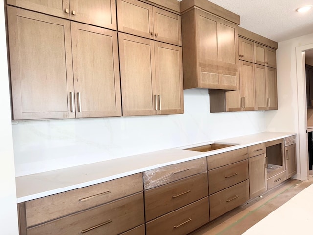 17970 103rd Ave N, Maple Grove, MN 55311 - kitchen featuring black electric stovetop, light countertops, and a textured ceiling
