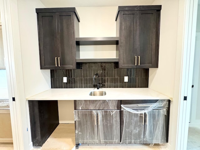 17970 103rd Ave N, Maple Grove, MN 55311 - kitchen featuring open shelves, dark brown cabinets, and tasteful backsplash