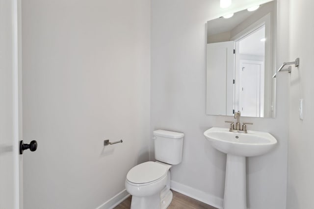17970 103rd Ave N, Maple Grove, MN 55311 - bathroom with toilet and wood finished floors