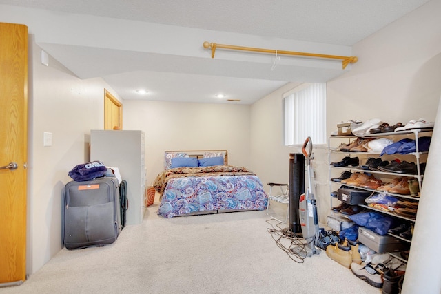 carpeted bedroom featuring recessed lighting