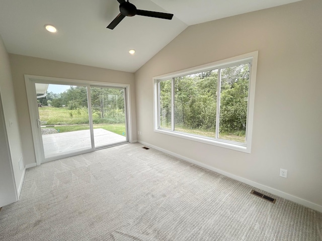 carpeted spare room featuring a ceiling fan, baseboards, vaulted ceiling, and recessed lighting