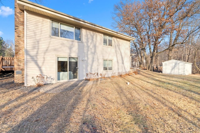 2622 159th Ave NE, Ham Lake, MN 55304 - back of property featuring a storage unit and an outbuilding