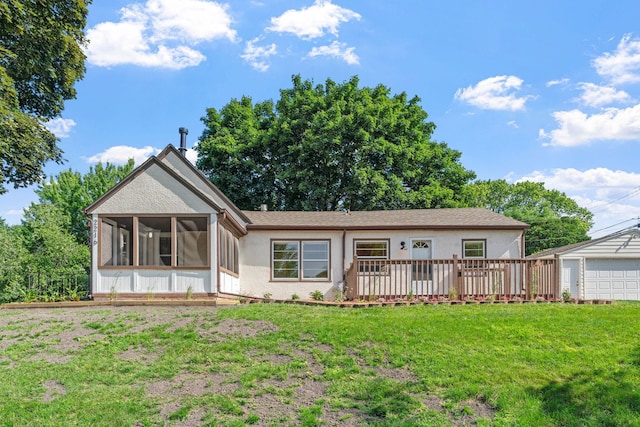 2216 57th St, Minneapolis, MN 55419 - back of house with a sunroom, a yard, stucco siding, a detached garage, and a wooden deck