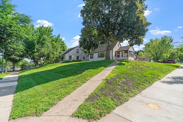 2216 57th St, Minneapolis, MN 55419 - view of front facade featuring a front yard