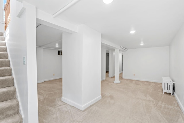 2216 57th St, Minneapolis, MN 55419 - finished basement featuring radiator heating unit, light carpet, stairway, and recessed lighting