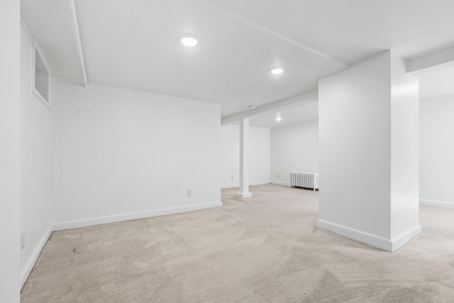 2216 57th St, Minneapolis, MN 55419 - finished below grade area featuring radiator, carpet floors, and recessed lighting