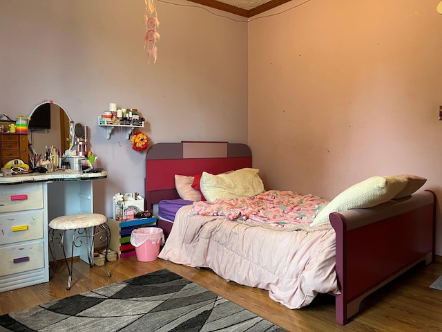1141 Mahogany St, Mora, MN 55051 - bedroom with wood finished floors and ornamental molding