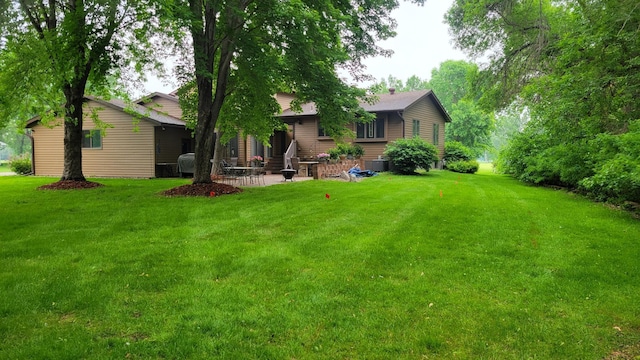 17473 Fairway Cir, Cold Spring, MN 56320 - view of grassy yard with central AC unit