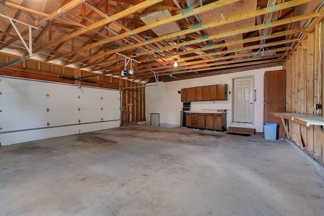 17473 Fairway Cir, Cold Spring, MN 56320 - garage featuring a garage door opener